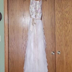 Cream colored floral ruffled evening gown